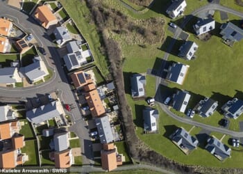Beadnell, Northumberland, which banned new holiday homes has now been split into two estates - one packed with year-round residents and another dominated by old second houses.