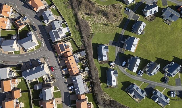 Beadnell, Northumberland, which banned new holiday homes has now been split into two estates - one packed with year-round residents and another dominated by old second houses.