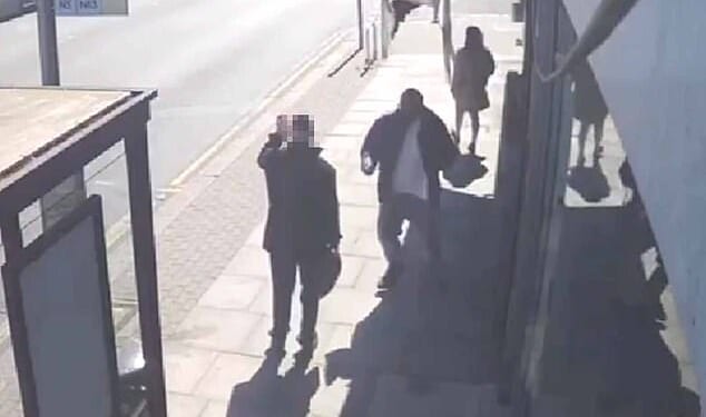 Video obtained by the Daily Mail the suspect in yesterday's terror attack rushing a man waiting at a bus stop and frantically knifing him before two heroic members of the public run towards him