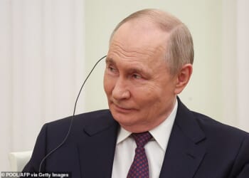 Russia is preparing to take NATO on in a war and may be ready to attack within just a year of ending its invasion of Ukraine. Pictured - Vladimir Putin at a meeting at the Kremlin on April 22, 2026