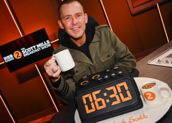 Radio 2 Breakfast Show host Scott Mills, pictured last January on his first Radio 2 breakfast show, was hauled off air last Tuesday and his contract has now been terminated over his 'personal conduct'. Police have confirmed the complainant was under the age of 16