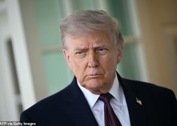Donald Trump speaks to the press outside the Oval Office at the White House in Washington, DC, on April 13