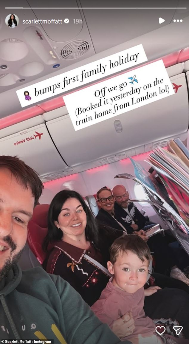 While the rows have continued to dominate headlines, Scarlett removed herself from the furore by jetting away with her fiancé Scott Dobinson and son Jude, two, as she shared an image from a plane on Monday morning