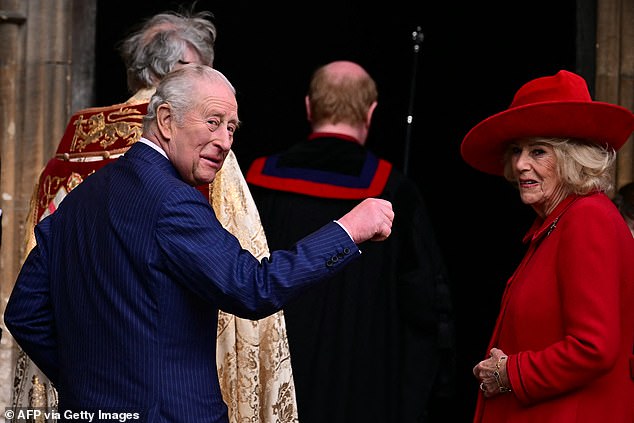 King Charles smiles as he arrives with Queen Camilla for the Easter Service on Sunday April 5, 2026