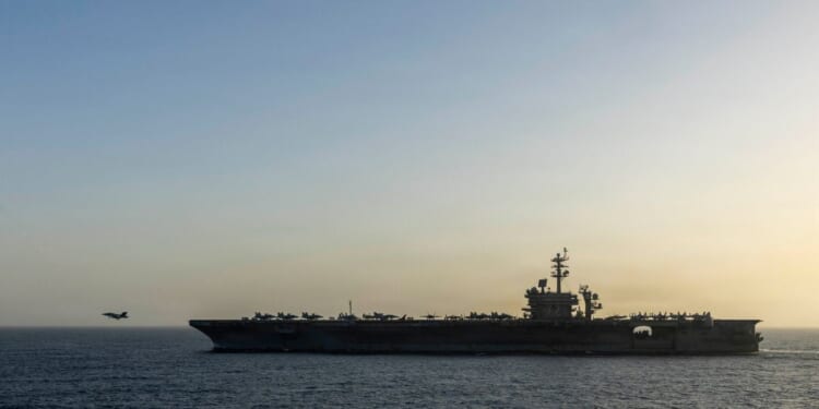 USS Abraham Lincoln conducts U.S. blockade operations related to the Strait of Hormuz on April 16, 2026, in the Arabian Sea.