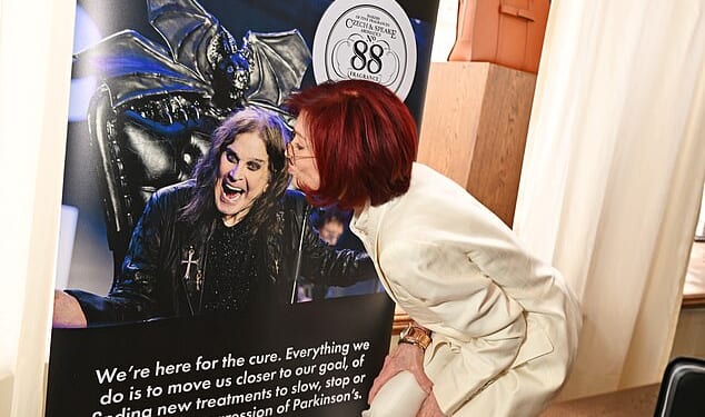 Sharon Osbourne kissed a picture of her late husband Ozzy as she attended a Parkinson's charity event on Wednesday