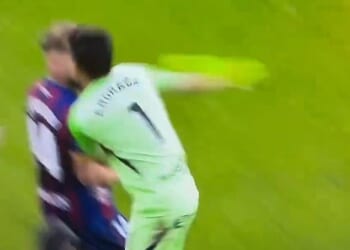 A goalkeeper floored an opponent in the Spanish second division, sparking a mass brawl