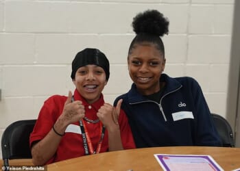 Jasmine Amadori, 18 (left) with her friend Esther Onyedikachi Iroh at one of Natwest's financial classes