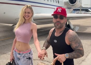 Influencer Sasha Sobhani, 38, the son of a senior Iranian official, has sparked outrage after flaunting his lavish lifestyle on social media, as millions of Iranians face war and ongoing oppression. Screen grab from a clip posted on his Instagram shows the 38-year-old is kissing the Spanish model – who carries a £25,000 Hermes Birkin bag