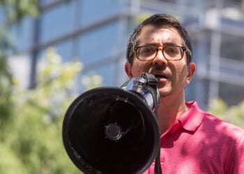 Jose Garza speaks during #CloseTheCamps: MoveOn, United We Dream, American Friends Service Committee, and Families Belong Together led protests across the country at members of Congress' offices to demand the closure of immigrant detention centers.
