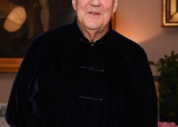 Stephen Fry has sued a tech conference for £100,000 in damages after he fell six feet off stage during an appearance, breaking his leg, hip and ribs