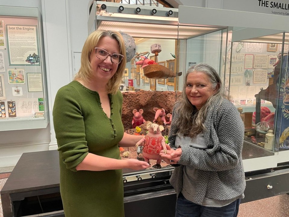 Emily Firmin and Cllr Cornell welcoming Mother Clanger puppet home.