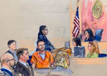It was the first time that he had been seen publicly since Monday, when he was arraigned on three counts, including attempted assassination and two guns charges