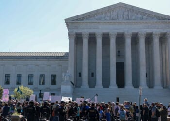 Protesters gather outside the Supreme Court building on April 27, 2026.