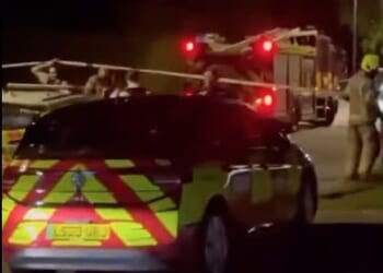 Video footage from the scene shows police and fire crews set up behind a cordon