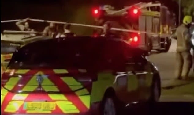 Video footage from the scene shows police and fire crews set up behind a cordon