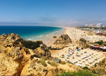 View of a crowded beach in the Algarve, Portugal