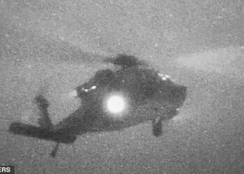 A helicopter carries U.S. Marines from the amphibious assault ship USS Tripoli at an unknown location, in what the U.S. Central Command (CENTCOM) says is an operation to board and seize Iranian-flagged cargo ship M/V Touska, in this screen grab taken from a handout video released on April 20, 2026. U.S. Central Command via X/Handout via REUTERS    THIS IMAGE HAS BEEN SUPPLIED BY A THIRD PARTY. MANDATORY CREDIT  VERIFICATION:                                     - Location and date could not be verified - No older version of the video was found posted before April 20