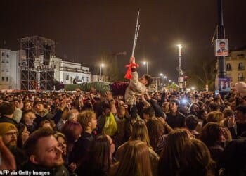People attend the so-called concert 'Rendszerbonto' ("Demolition of the System"), which features more than 40 artists and is organized by the citizen resistance movement on Heroes' Square in Budapest on April 10, 2026, two days before general elections