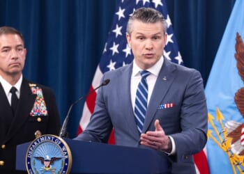 Secretary of War Pete Hegseth speaks alongside CENTCOM Commander Admiral Brad Cooper during a press briefing at the Pentagon in Washington, D.C., on April 16, 2026.