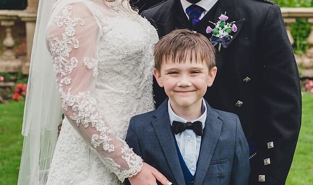 Charmain Speirs and Eric Adusah on their wedding day in 2014 with her son Isaac, then seven