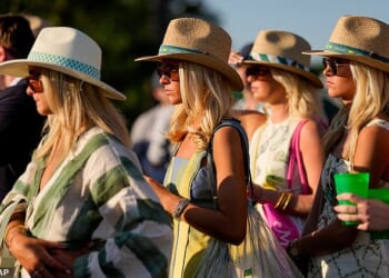Patrons watch on the 17th hole during the third round of the Masters golf tournament at the Augusta National Golf Club, Saturday, April 11