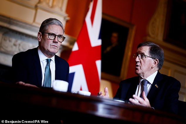 Former Nato chief George Robertson, who co-chaired last year's strategic defence review (SDR), claimed officials have failed to keep an up-to-date contact list with personnel Pictured: Prime Minister Sir Keir Starmer and Lord Robertson pictured in 2024 at Downing Street