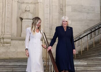 Sarah Jessica Parker and Britain's Queen Camilla descend the staircase during a literary engagement at New York Public Library on day three of the State Visit of King Charles III and Queen Camilla to the United States of America, on April 29, 2026 in New York, U.S