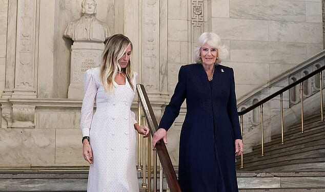 Sarah Jessica Parker and Britain's Queen Camilla descend the staircase during a literary engagement at New York Public Library on day three of the State Visit of King Charles III and Queen Camilla to the United States of America, on April 29, 2026 in New York, U.S