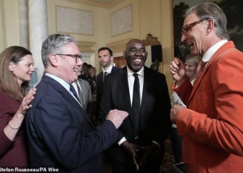 ArsenalFanTV founder Robbie Lyle (centre) at 10 Downing Street with Prime Minister Sir Keir Starmer and Gunners legend Tony Adams