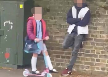 Police were called after tempers flared when parents challenged the man - who is in his early 20s and is believed to have mental health issues - who they claimed had been monitoring children outside Laleham Church of England Primary School in Surrey