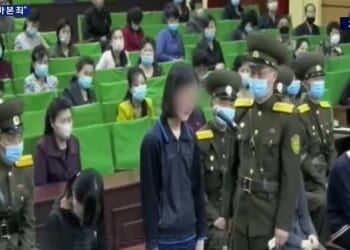 The tape shows a public shaming session in a large auditorium, where scores of young North Koreans are lined up in front of military men and berated for their 'crimes'