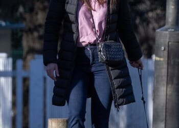 Claire Freemantle is seen out walking her dog. Three years ago her Land Voer crashed into a school, killing two