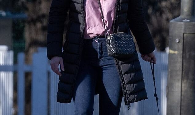 Claire Freemantle is seen out walking her dog. Three years ago her Land Voer crashed into a school, killing two