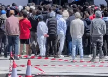 Footage captured migrants clambering on to security gates as they attemped to get into the consulates in Spain