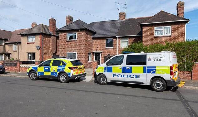 Pictured: Police cars outside a property on Hardale Drive in Redcar, North Yorkshire, where an  infant girl was attacked by the dog at at around 1.30pm yesterday