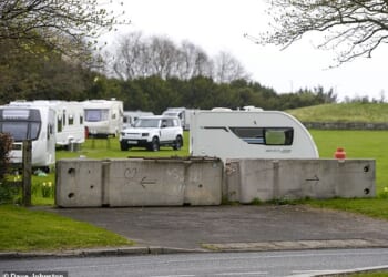 Travellers have occupied the Huly Hill site, which dates back to 2500 BC, despite residents erecting concrete blocks at the entrance