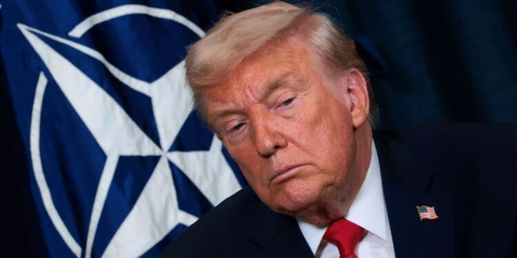 President Donald Trump attends a meeting with NATO Secretary General Mark Rutte at the World Economic Forum Annual Meeting on Jan. 21, 2026 in Davos, Switzerland.