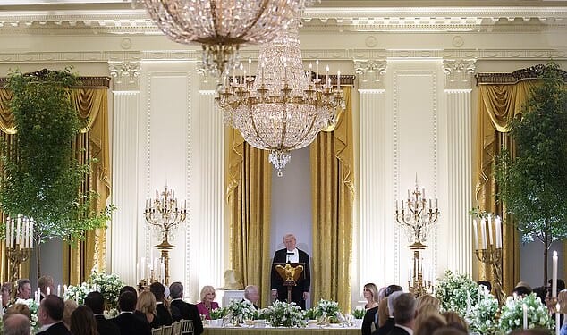 Amidst the floral elegance of a White House East Room transformed into a lush English garden, the evening's diplomatic focus shifted sharply toward global security