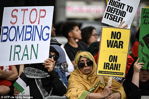 New polling indicates that the Trump administration does not have widespread American support for the war. Protesters are pictured above in Texas on April 7