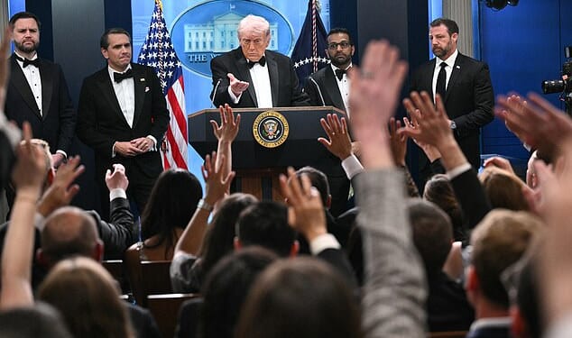 Most reporters had rushed over from the Hilton hotel which was hosting the dinner just over one mile away, with many still wearing their black tie and ball gowns from the ritzy gala