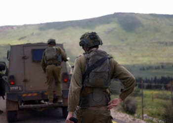 Israeli soldiers patrol along the Israel-Lebanon border on April 10, 2026.