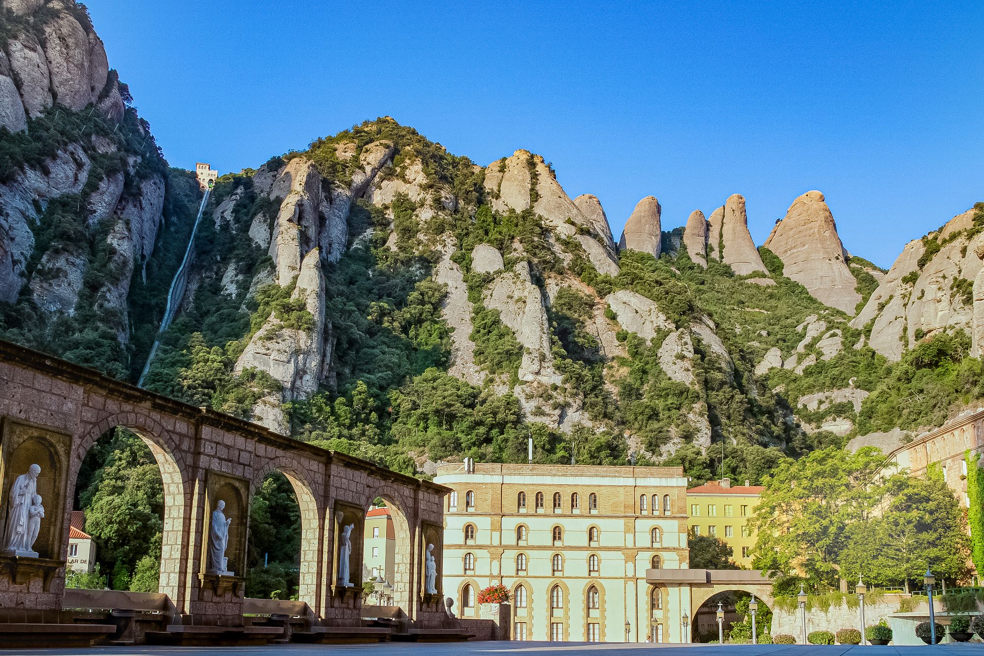 An image collage containing 1 images, Image 1 shows Monastery of Montserrat