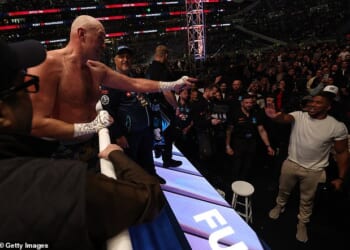 Tyson Fury (left) and Anthony Joshua have signed a contract to fight, claims Turki Alalshikh