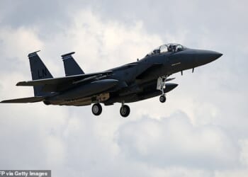 (FILES) A US Air Force (USAF) F-15E Eagle fighter jet, is pictured as it prepares to land at RAF (Royal Air Force) Lakenheath, east of England, on June 15, 2020. A US warplane has gone down over Iran and US forces have rescued one of the crew, major US media outlets reported on Friday 3, after Iranian media aired footage of aircraft wreckage. (Photo by CHRIS RADBURN / AFP via Getty Images)