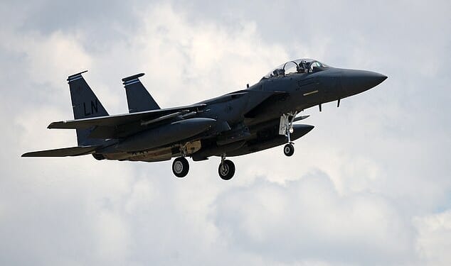 (FILES) A US Air Force (USAF) F-15E Eagle fighter jet, is pictured as it prepares to land at RAF (Royal Air Force) Lakenheath, east of England, on June 15, 2020. A US warplane has gone down over Iran and US forces have rescued one of the crew, major US media outlets reported on Friday 3, after Iranian media aired footage of aircraft wreckage. (Photo by CHRIS RADBURN / AFP via Getty Images)