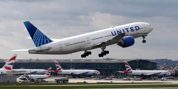 A United Airlines Boeing 777 takes off from Heathrow Airport on March 31, 2026, in London, England.