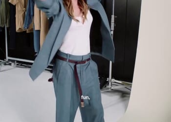 Victoria Beckham looked chic in a slouchy suit a she danced on the set of a photoshoot for her fast-selling GAP range on Tuesday
