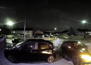 In the first incident, a hooded figure (pictured) tried to break into vehicles before being chased away by the homeowner - who had no time to put on any clothes