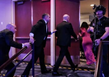 White House Deputy Chief of Staff for Policy Stephen Miller and his wife Katie Miller are escorted out of the annual White House Correspondents Association Dinner after a shooting occurred on April 25, 2026 in Washington, DC.